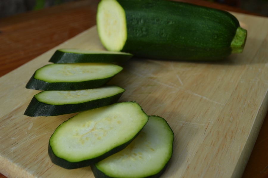 sliced courgettes on a chopping board
